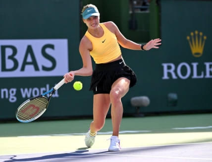 Mar 12, 2023; Indian Wells, CA, USA;    Anastasia Potapova (RUS) hits a shot in her fourth round match against Jessica Pegula (USA) in the BNP Paribas Open at the Indian Wells Tennis Garden. Mandatory Credit: Jayne Kamin-Oncea-USA TODAY Sports
