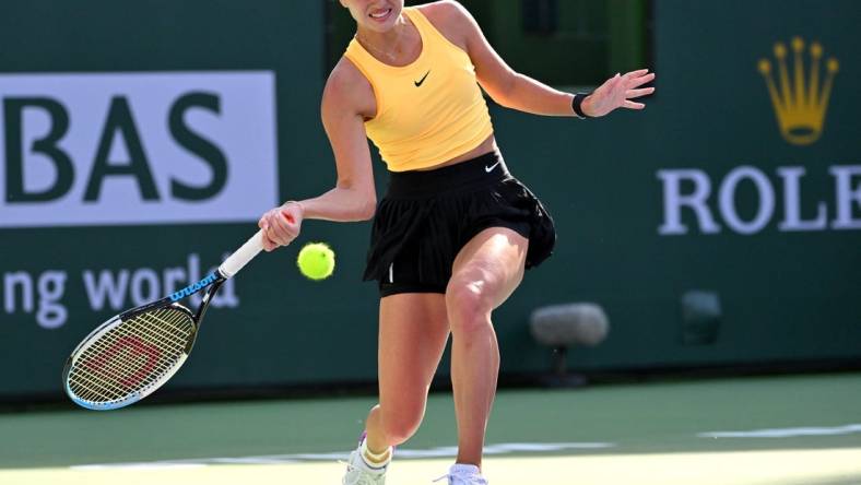 Mar 12, 2023; Indian Wells, CA, USA;    Anastasia Potapova (RUS) hits a shot in her fourth round match against Jessica Pegula (USA) in the BNP Paribas Open at the Indian Wells Tennis Garden. Mandatory Credit: Jayne Kamin-Oncea-USA TODAY Sports