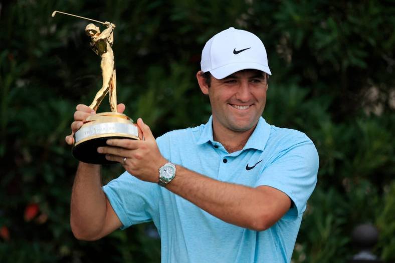 March 12: Scottie Scheffler holds up The Players Championship trophy at TPC Sawgrass in Ponte Vedra Beach, Florida.

Syndication Florida Times Union