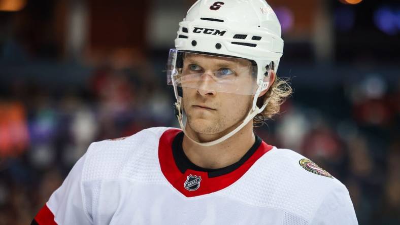 Mar 12, 2023; Calgary, Alberta, CAN; Ottawa Senators defenseman Jakob Chychrun (6) against the Calgary Flames during the second period at Scotiabank Saddledome. Mandatory Credit: Sergei Belski-USA TODAY Sports