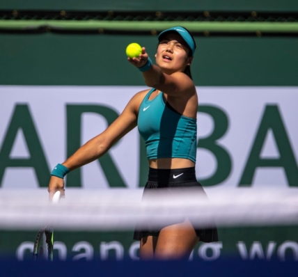 Emma Raducanu of Great Britain prepares a serve to Beatriz Haddad Maia of Brazil during their third-round match at the BNP Paribas Open at the Indian Wells Tennis Garden in Indian Wells, Calif., Monday, March 13, 2023.