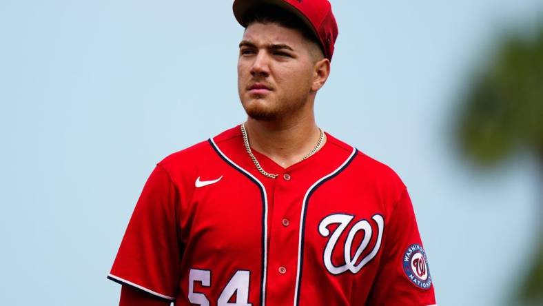 Mar 14, 2023; Port St. Lucie, Florida, USA; Washington Nationals starting pitcher Cade Cavalli (54) walks onto the field prior to a game against the New York Mets at Clover Park. Mandatory Credit: Rich Storry-USA TODAY Sports