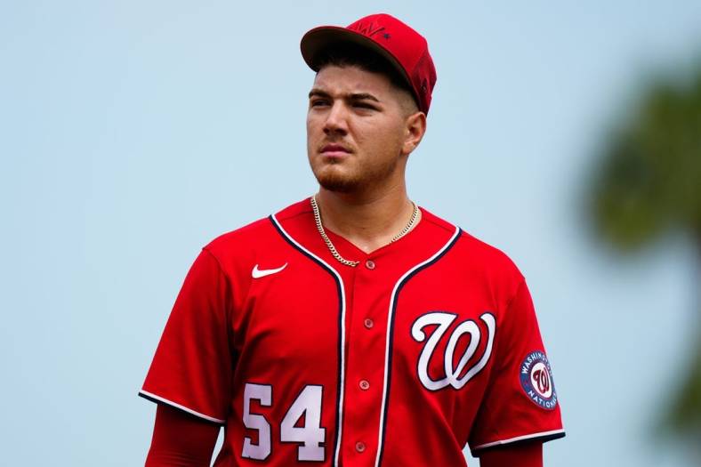 Mar 14, 2023; Port St. Lucie, Florida, USA; Washington Nationals starting pitcher Cade Cavalli (54) walks onto the field prior to a game against the New York Mets at Clover Park. Mandatory Credit: Rich Storry-USA TODAY Sports