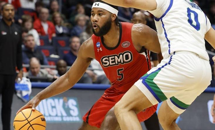 Mar 14, 2023; Dayton, OH, USA;  Southeast Missouri State Redhawks guard Chris Harris (5) looks to play the ball defended by Texas A&M-CC Islanders guard Trevian Tennyson (0) in the second half at UD Arena. Mandatory Credit: Rick Osentoski-USA TODAY Sports