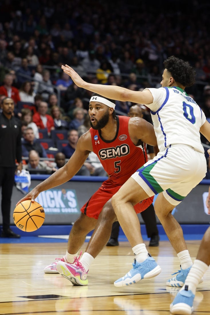Mar 14, 2023; Dayton, OH, USA;  Southeast Missouri State Redhawks guard Chris Harris (5) looks to play the ball defended by Texas A&M-CC Islanders guard Trevian Tennyson (0) in the second half at UD Arena. Mandatory Credit: Rick Osentoski-USA TODAY Sports