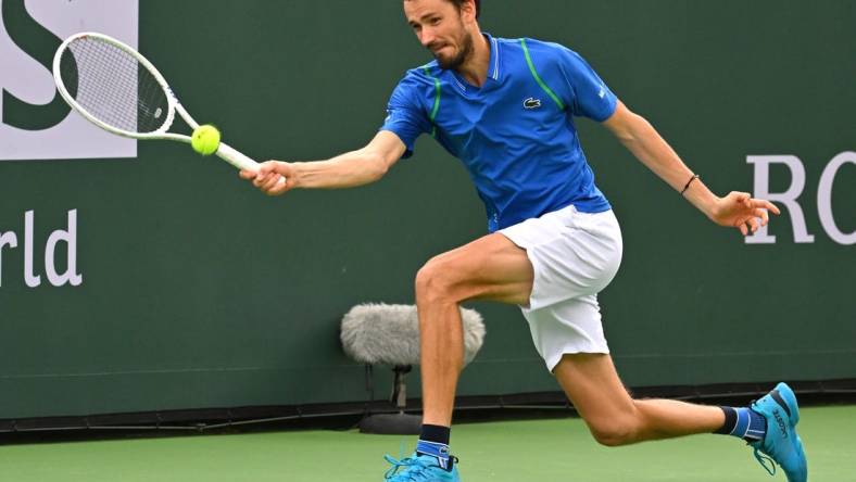 Mar 14, 2023; Indian Wells, CA, USA; Daniil Medvedev (RUS) hits a shot as he defeated Alexander Zverev (GER) in the fourth round of the BNP Paribas Open at the Indian Wells Tennis Garden. Mandatory Credit: Jayne Kamin-Oncea-USA TODAY Sports