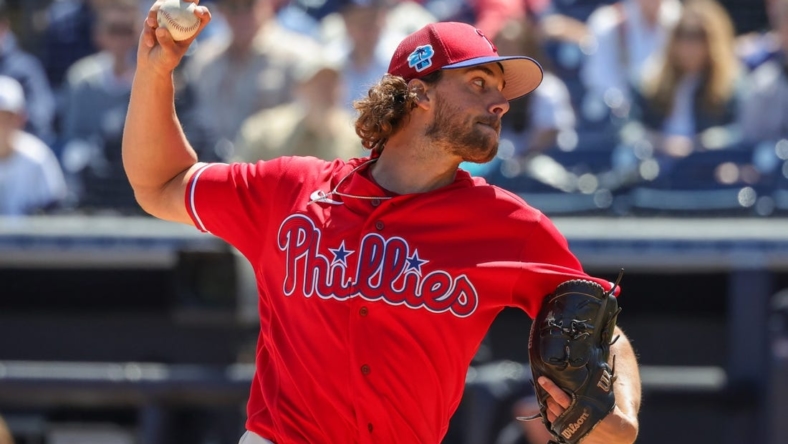 Mar 15, 2023; Tampa, Florida, USA; Philadelphia Phillies starting pitcher Aaron Nola (27) throws a pitch during the first inning against the New York Yankees at George M. Steinbrenner Field. Mandatory Credit: Mike Watters-USA TODAY Sports