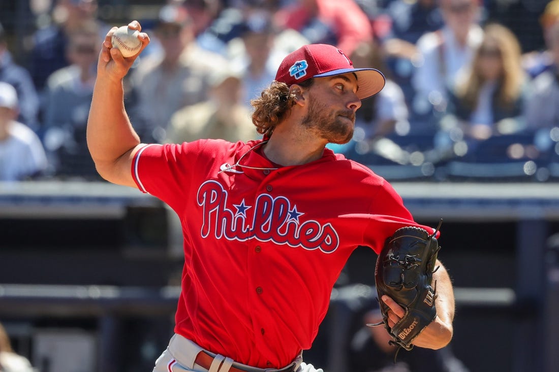 Mar 15, 2023; Tampa, Florida, USA; Philadelphia Phillies starting pitcher Aaron Nola (27) throws a pitch during the first inning against the New York Yankees at George M. Steinbrenner Field. Mandatory Credit: Mike Watters-USA TODAY Sports