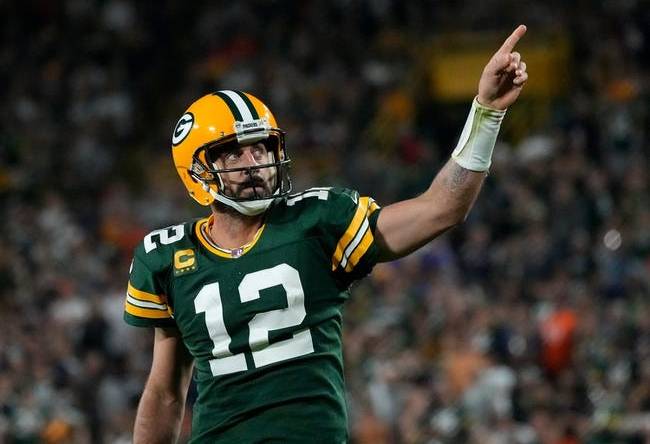 Green Bay Packers quarterback Aaron Rodgers (12) celebrates after rushing for a first down during the fourth quarter of their game against the Chicago Bears on Sunday, Sept. 18, 2022 at Lambeau Field in Green Bay.

Mjs Packers Bears Packers19 3137 114468354