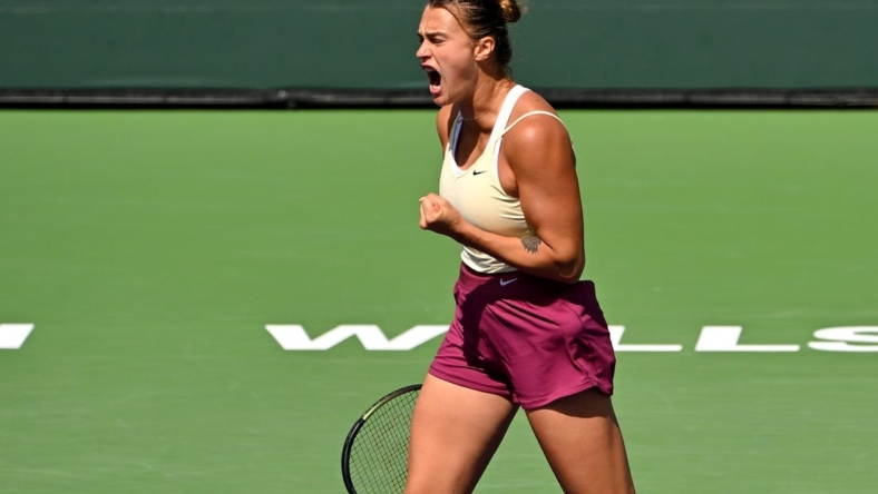 Mar 15, 2023; Indian Wells, CA, USA;  Aryna Sabalenka celebrates after winning a point as she defeats Coco Gauff (USA) in the quarterfinals of the BNP Paribas Open at the Indian Wells Tennis Garden. Mandatory Credit: Jayne Kamin-Oncea-USA TODAY Sports