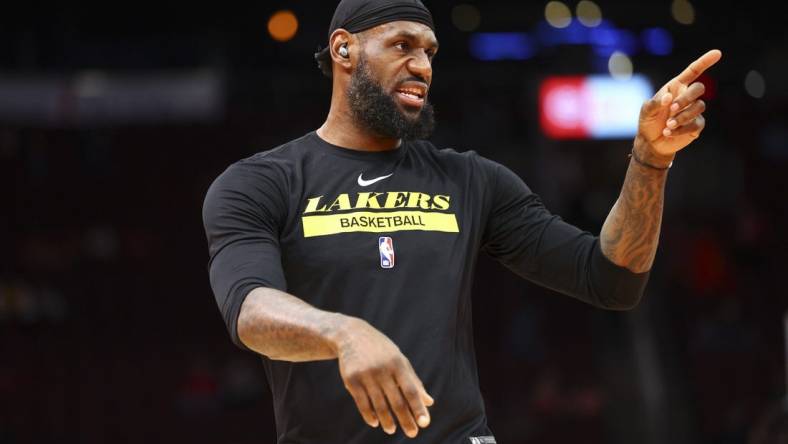 Mar 15, 2023; Houston, Texas, USA; Los Angeles Lakers forward LeBron James (6) shoots baskets before the game against the Houston Rockets at Toyota Center. Mandatory Credit: Troy Taormina-USA TODAY Sports