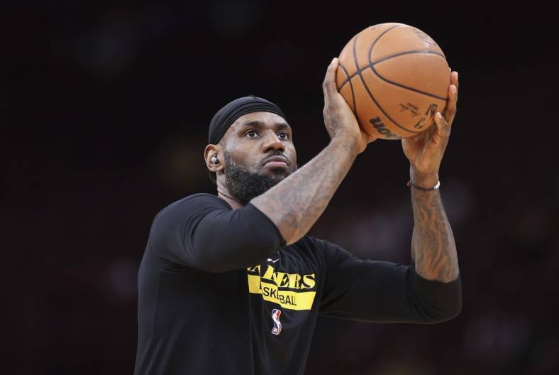 Mar 15, 2023; Houston, Texas, USA; Los Angeles Lakers forward LeBron James (6) shoots baskets before the game against the Houston Rockets at Toyota Center. Mandatory Credit: Troy Taormina-USA TODAY Sports
