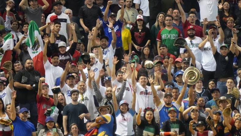 Fans cheer from the stands as Colombia takes on Mexico during their World Baseball Classic game at Chase Field in Phoenix on March 11, 2023.

Baseball World Baseball Classic Opening Day