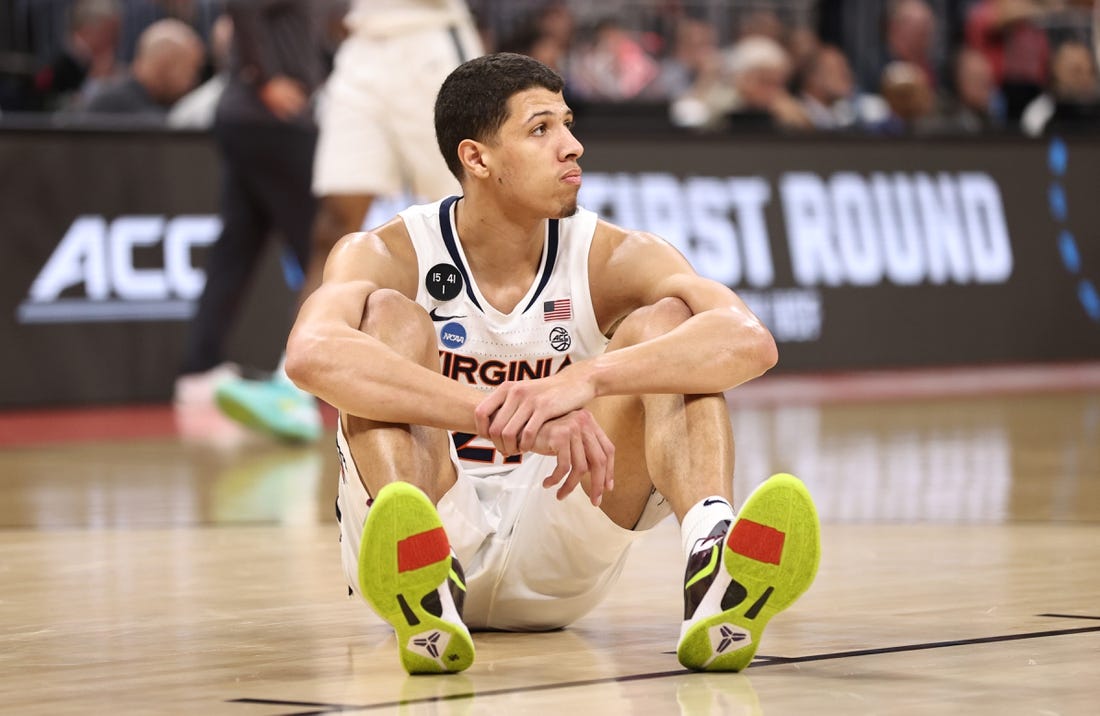 Mar 16, 2023; Orlando, FL, USA; Virginia Cavaliers forward Kadin Shedrick (21) reacts after the loss against the Furman Paladins during the second half at Amway Center. Mandatory Credit: Matt Pendleton-USA TODAY Sports