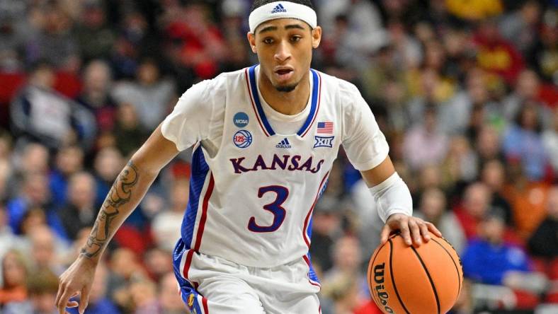 Mar 16, 2023; Des Moines, IA, USA; Kansas Jayhawks guard Dajuan Harris Jr. (3) dribbles the ball against the Howard Bison during the first half at Wells Fargo Arena. Mandatory Credit: Jeffrey Becker-USA TODAY Sports