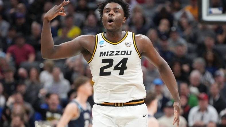 Mar 16, 2023; Sacramento, CA, USA; Missouri Tigers guard Kobe Brown (24) reacts after scoring a basket agianst the Utah State Aggies during the second half at Golden 1 Center. Mandatory Credit: Kyle Terada-USA TODAY Sports