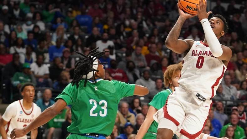 Mar 16, 2023; Birmingham, AL, USA; Alabama Crimson Tide guard Jaden Bradley (0) shoots over Texas A&M-CC Islanders guard Ross Williams (23) during the first half in the first round of the 2023 NCAA Tournament at Legacy Arena. Mandatory Credit: Marvin Gentry-USA TODAY Sports