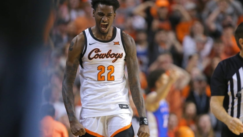 Oklahoma State Cowboys forward Kalib Boone (22) celebrates during a men's college basketball game between the Oklahoma State University Cowboys and the Kansas Jayhawks at Gallagher-Iba Arena in Stillwater, Okla., Wednesday, Feb. 15, 2023.

osu mbb