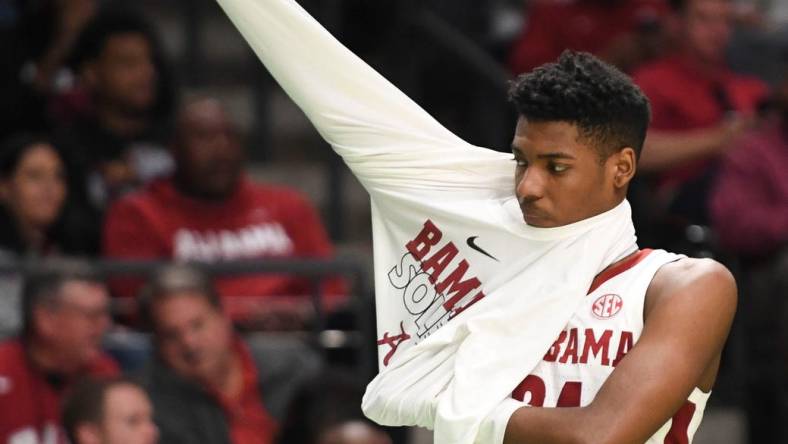 Mar 16, 2023; Birmingham, AL, USA;  Alabama forward Brandon Miller (24), who was held scoreless, puts on a warmup after coming to the bench in the second half at Legacy Arena. Alabama advanced to the second round of the NCAA Tournament with a 96-75 win over Texas A&M Corpus Christi. Mandatory Credit: Gary Cosby Jr.-Tuscaloosa News

Ncaa Basketball Ncaa Tournament Alabama Vs Texas A M Corpus Christi