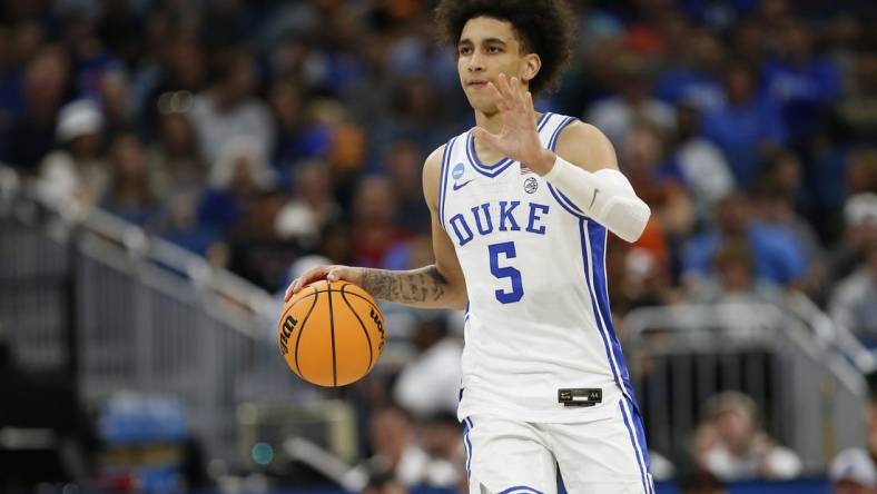 Mar 16, 2023; Orlando, FL, USA; Duke Blue Devils guard Tyrese Proctor (5) dribbles the ball during the second half against the Oral Roberts Golden Eagles at Amway Center. Mandatory Credit: Russell Lansford-USA TODAY Sports