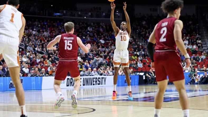 Mar 16, 2023; Des Moines, IA, USA; Texas Longhorns guard Sir'Jabari Rice (10) shoots the ball against the Colgate Raiders during the first half at Wells Fargo Arena. Mandatory Credit: Reese Strickland-USA TODAY Sports