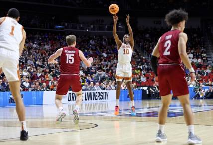 Mar 16, 2023; Des Moines, IA, USA; Texas Longhorns guard Sir'Jabari Rice (10) shoots the ball against the Colgate Raiders during the first half at Wells Fargo Arena. Mandatory Credit: Reese Strickland-USA TODAY Sports