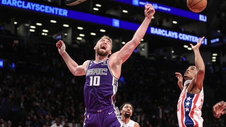Mar 16, 2023; Brooklyn, New York, USA;  Sacramento Kings forward Domantas Sabonis (10) reacts after loosing the ball in the second quarter against the Brooklyn Nets at Barclays Center. Mandatory Credit: Wendell Cruz-USA TODAY Sports