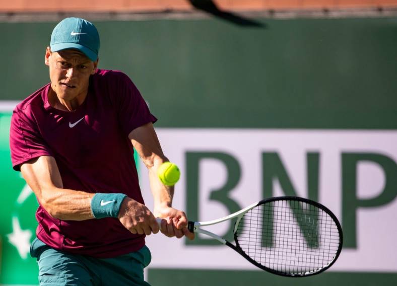 Jannik Sinner of Italy hits to Taylor Fritz of the United States during their quarterfinal match at the BNP Paribas Open at the Indian Wells Tennis Garden in Indian Wells, Calif., Thursday, March 16, 2023.