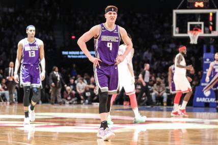 Mar 16, 2023; Brooklyn, New York, USA;  Sacramento Kings guard Kevin Huerter (9) walks off the court after getting injured in the first quarter against the Brooklyn Nets at Barclays Center. Mandatory Credit: Wendell Cruz-USA TODAY Sports