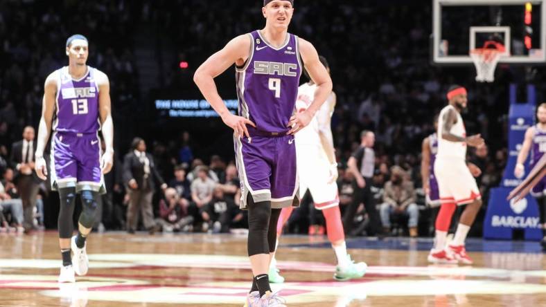 Mar 16, 2023; Brooklyn, New York, USA;  Sacramento Kings guard Kevin Huerter (9) walks off the court after getting injured in the first quarter against the Brooklyn Nets at Barclays Center. Mandatory Credit: Wendell Cruz-USA TODAY Sports