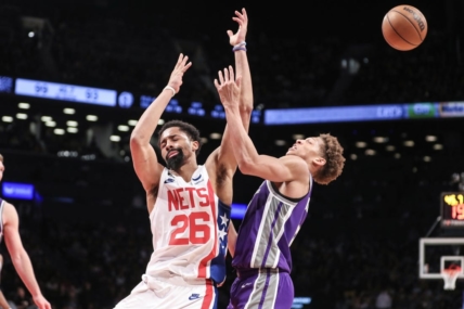 Mar 16, 2023; Brooklyn, New York, USA;  Brooklyn Nets guard Spencer Dinwiddie (26) collides with Sacramento Kings forward Kessler Edwards (17) in the fourth quarter at Barclays Center. Mandatory Credit: Wendell Cruz-USA TODAY Sports