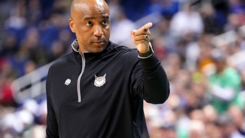 Kennesaw State Owls head coach Amir Abdur-Rahim instructs the team in the first half of a first-round college basketball game between the Kennesaw State Owls and the Xavier Musketeers in the NCAA Tournament, Friday, March 17, 2023, at Greensboro Coliseum in Greensboro, N.C.

Ncaa Xavier Kennesaw State Basketball March 17 0033