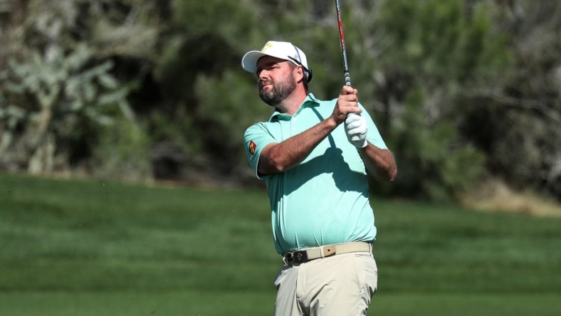 Mar 17, 2023; Tucson, Arizona, USA; Marc Leishman hits from the fairway of the 4th hole during the first round of the LIV Golf event at The Gallery Golf Club. Mandatory Credit: Zachary BonDurant-USA TODAY Sports