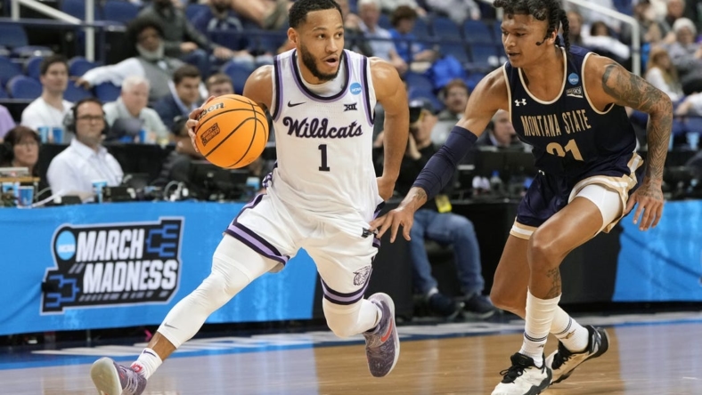 Mar 17, 2023; Greensboro, NC, USA; Kansas State Wildcats guard Markquis Nowell (1) controls the ball against Montana State Bobcats guard RaeQuan Battle (21)  in the second half at Greensboro Coliseum. Mandatory Credit: Bob Donnan-USA TODAY Sports