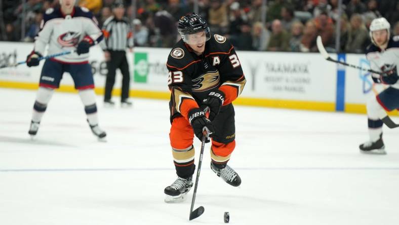 Mar 17, 2023; Anaheim, California, USA; Anaheim Ducks right wing Jakob Silfverberg (33) controls the puck against the Columbus Blue Jackets in the third period at Honda Center. Mandatory Credit: Kirby Lee-USA TODAY Sports