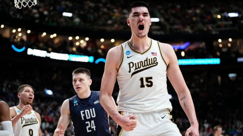 Mar 17, 2023; Columbus, Ohio, USA;  Purdue Boilermakers center Zach Edey (15) celebrates making a basket during the first round of the NCAA men   s basketball tournament against the Fairleigh Dickinson Knights at Nationwide Arena. Mandatory Credit: Adam Cairns-The Columbus Dispatch

Basketball Ncaa Men S Basketball Tournament