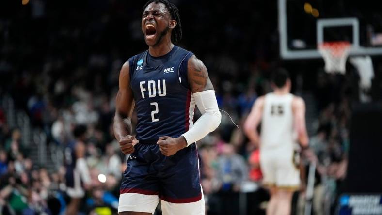 Mar 17, 2023; Columbus, Ohio, USA;  Fairleigh Dickinson Knights guard Demetre Roberts (2) celebrates during the first round of the NCAA men   s basketball tournament against the Purdue Boilermakers at Nationwide Arena. The Fairleigh Dickinson Knights won 63-58. Mandatory Credit: Adam Cairns-The Columbus Dispatch

Basketball Ncaa Men S Basketball Tournament