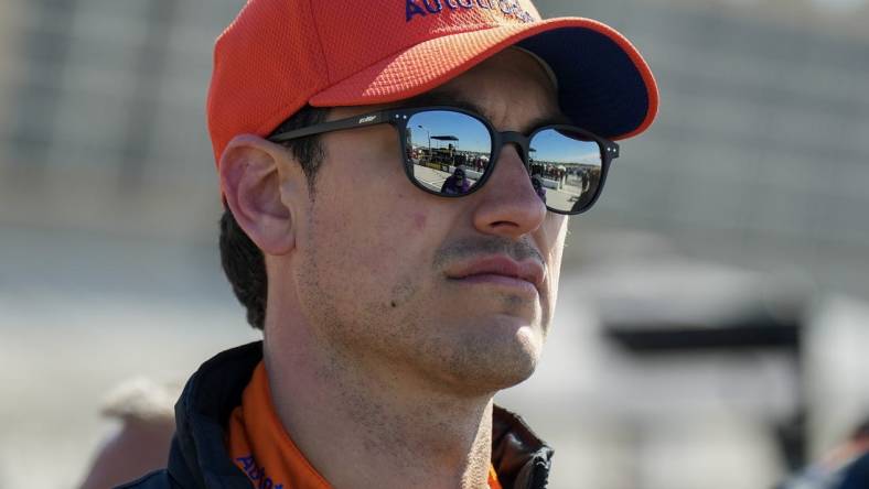 Mar 18, 2023; Hampton, Georgia, USA; NASCAR Cup Series driver Joey Logano (22) watches the scoreboard during qualifying at Atlanta Motor Speedway. Mandatory Credit: David Yeazell-USA TODAY Sports