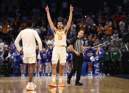Mar 18, 2023; Orlando, FL, USA;  Tennessee Volunteers forward Olivier Nkamhoua (13) celebrates after defeating the Duke Blue Devils in the second round of the 2023 NCAA Tournament at Legacy Arena. Mandatory Credit: Matt Pendleton-USA TODAY Sports