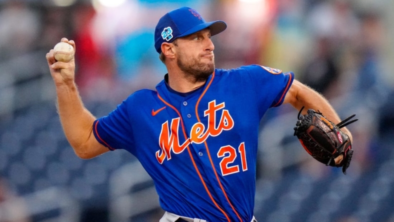 Mar 18, 2023; West Palm Beach, Florida, USA; New York Mets starting pitcher Max Scherzer (21) throws a pitch against the Houston Astros during the first inning at The Ballpark of the Palm Beaches. Mandatory Credit: Rich Storry-USA TODAY Sports