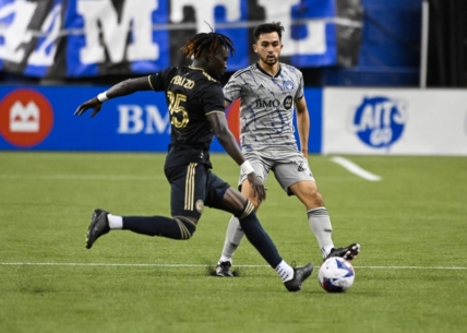 Mar 18, 2023; Montreal, Quebec, CAN; Philadelphia Union defender Olivier Mbaizo (15) defends the ball against CF Montreal midfielder Mathieu Choiniere (29) during first half at Olympic Stadium. Mandatory Credit: David Kirouac-USA TODAY Sports