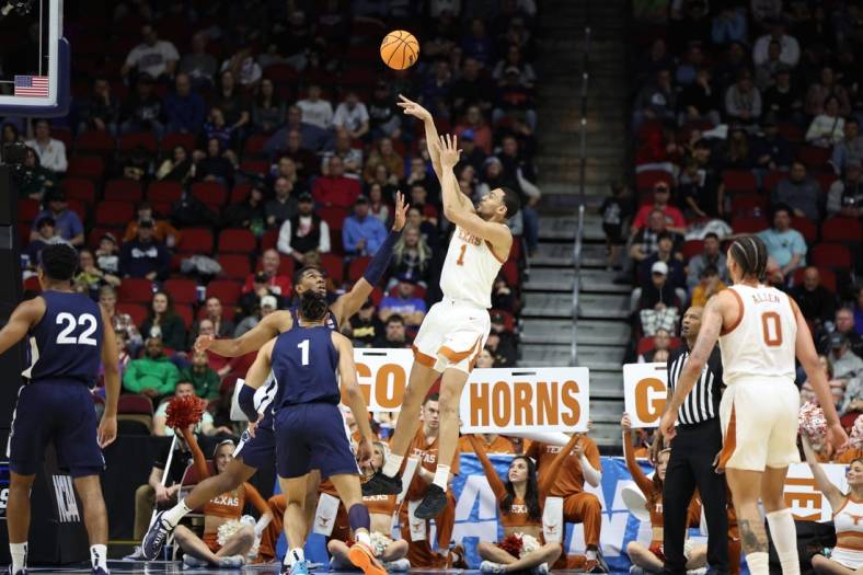 Mar 18, 2023; Des Moines, IA, USA; Texas Longhorns forward Dylan Disu (1) shoots the ball against against the Penn State Nittany Lions during the second half at Wells Fargo Arena. Mandatory Credit: Reese Strickland-USA TODAY Sports