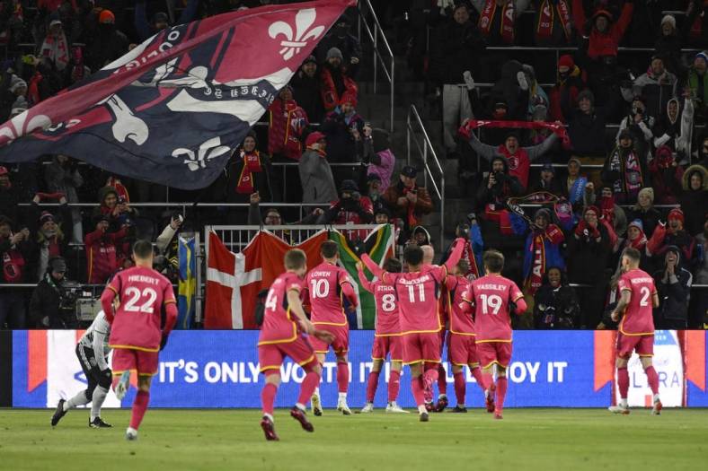 Mar 18, 2023; St. Louis, Missouri, USA; St. Louis City SC celebrate a goal from St. Louis City SC forward Klauss (9) against the San Jose Earthquakes during the first half at CITYPARK. Mandatory Credit: Jeff Le-USA TODAY Sports