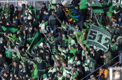 Mar 18, 2023; Houston, Texas, USA;  Fans cheer for Austin FC as they play against the Houston Dynamo FC in the first half at Shell Energy Stadium. Mandatory Credit: Thomas Shea-USA TODAY Sports