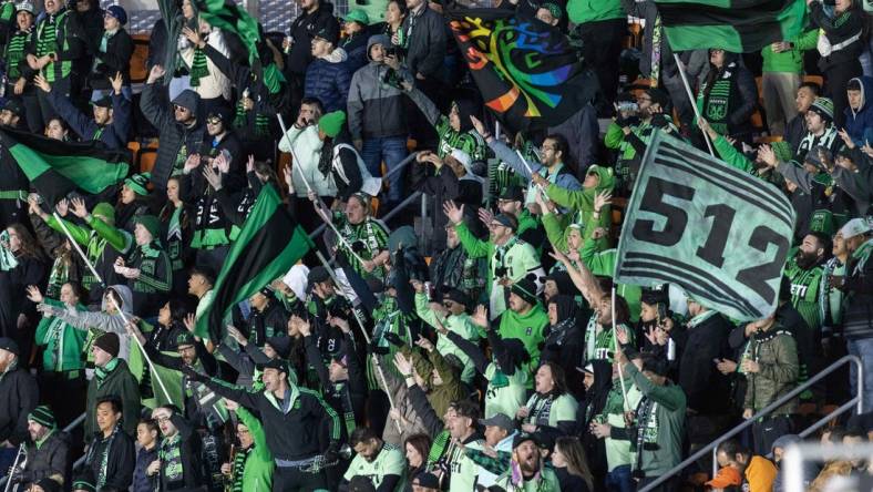 Mar 18, 2023; Houston, Texas, USA;  Fans cheer for Austin FC as they play against the Houston Dynamo FC in the first half at Shell Energy Stadium. Mandatory Credit: Thomas Shea-USA TODAY Sports