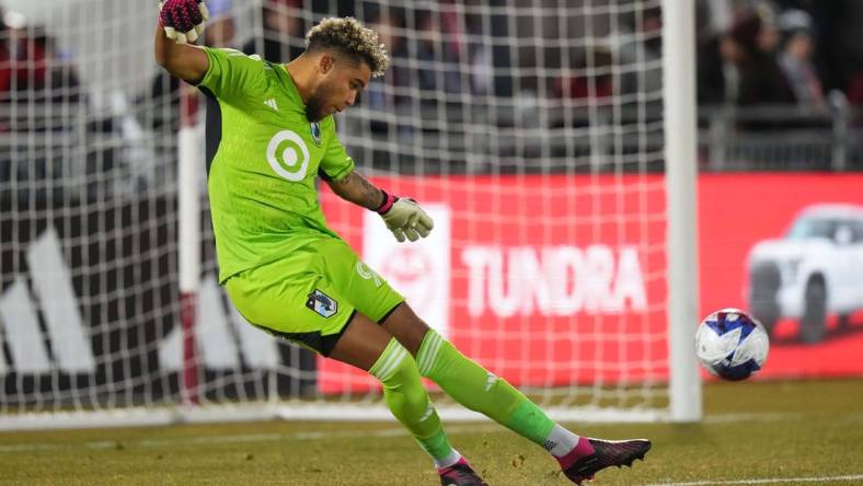 Mar 18, 2023; Commerce City, Colorado, USA; Minnesota United FC goalkeeper Dayne St. Clair kicks the ball against the Colorado Rapids at Dick's Sporting Goods Park. Mandatory Credit: Ron Chenoy-USA TODAY Sports