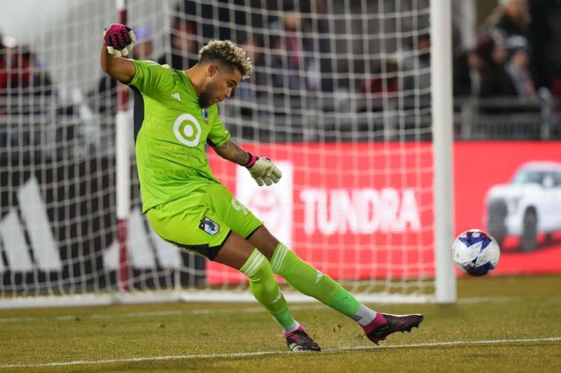 Mar 18, 2023; Commerce City, Colorado, USA; Minnesota United FC goalkeeper Dayne St. Clair kicks the ball against the Colorado Rapids at Dick's Sporting Goods Park. Mandatory Credit: Ron Chenoy-USA TODAY Sports