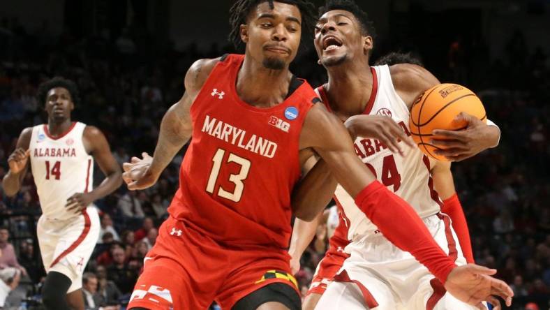 Mar 18, 2023; Birmingham, AL, USA; Alabama forward Brandon Miller (24) slips past Maryland guard Hakim Hart (13) on a drive to the basket at Legacy Arena during the second round of the NCAA Tournament. Mandatory Credit: Gary Cosby Jr.-Tuscaloosa News

Ncaa Basketball March Madness Alabama Vs Maryland