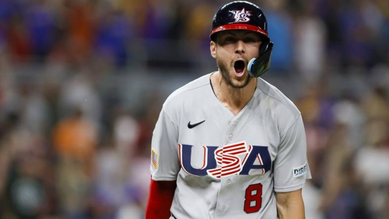 Mar 18, 2023; Miami, Florida, USA; USA shortstop Trea Turner (8) reacts after hitting a grand slam during the eighth inning against Venezuela at LoanDepot Park. Mandatory Credit: Sam Navarro-USA TODAY Sports