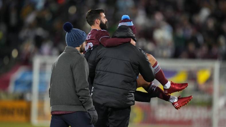 Mar 18, 2023; Commerce City, Colorado, USA; Colorado Rapids midfielder Jack Price (19) is taken off the pitch against the Minnesota United FC at Dick's Sporting Goods Park. Mandatory Credit: Ron Chenoy-USA TODAY Sports